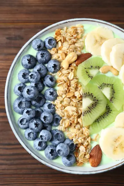 Tasty Smoothie Bowl Fresh Fruits Oatmeal Wooden Table Top View — Stock Photo, Image