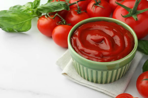 Bowl Tasty Ketchup Tomatoes Basil White Marble Table Closeup Space — Stock Photo, Image