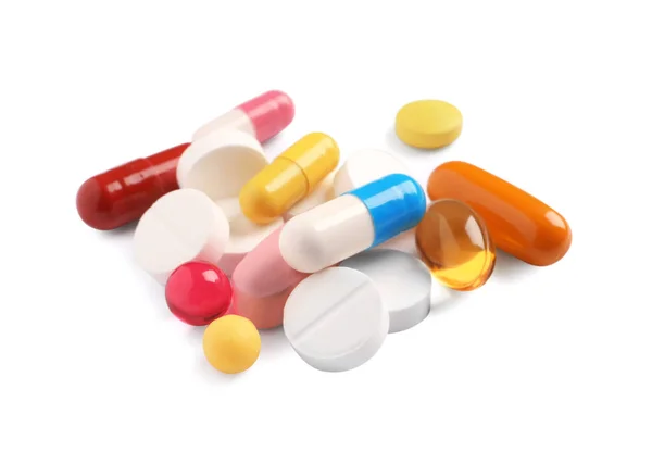 Muitas Pílulas Diferentes Isoladas Branco Tratamento Medicamentoso — Fotografia de Stock
