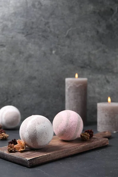 Bath Bombs Dry Flowers Burning Candles Black Table — Stock Photo, Image