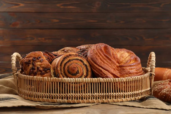 Wicker Basket Different Tasty Freshly Baked Pastries Table — Stock Photo, Image