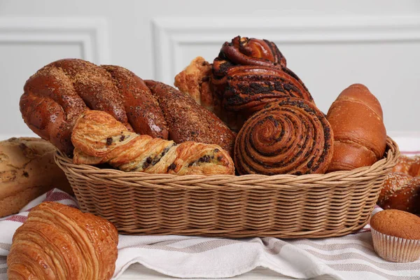 Wicker Basket Different Tasty Freshly Baked Pastries Table Closeup — Stock Photo, Image