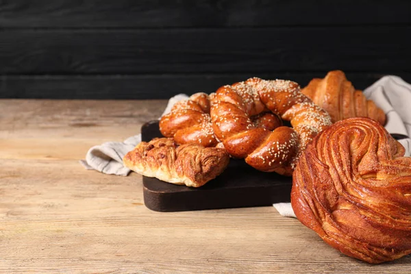 Different Tasty Freshly Baked Pastries Wooden Table Space Text — Stock Photo, Image