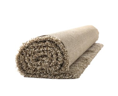 Tüylü halı beyaz arka plan üzerinde yuvarlandı. İç öğesi