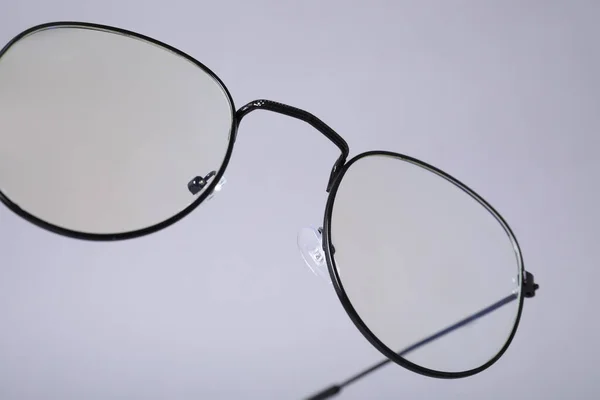 浅灰背景的时髦眼镜 — 图库照片
