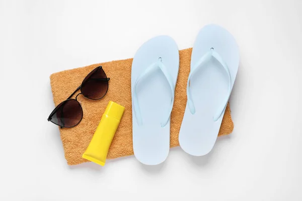 Flip Flops Sunscreen Stylish Sunglasses Soft Towel White Background Top — Stock Photo, Image
