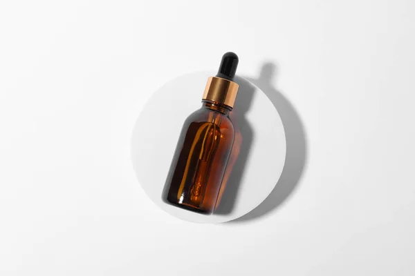 Fles Met Cosmetische Olie Witte Achtergrond Bovenaanzicht — Stockfoto