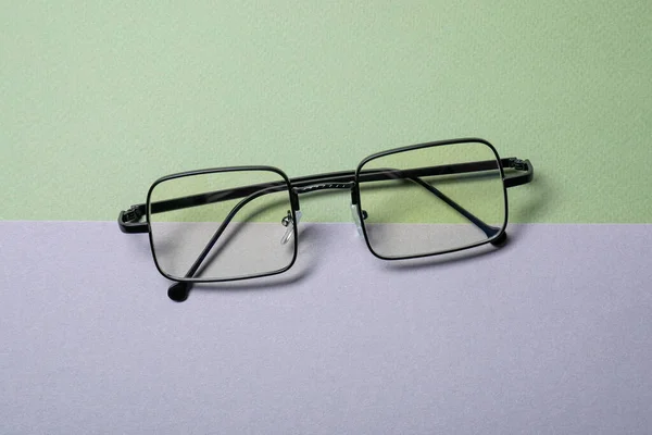 Snygga Par Glasögon Med Svart Ram Färg Bakgrund Ovanifrån — Stockfoto