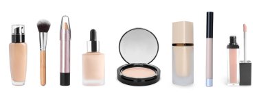 Yüz pudrası ve beyaz üzerine izole edilmiş diğer temellerle ayarlandı