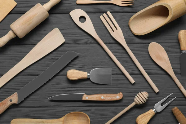 stock image Set of different kitchen utensils on grey wooden table, flat lay