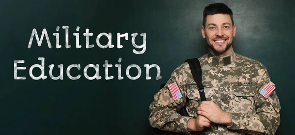 Military education. Cadet with backpack near green chalkboard