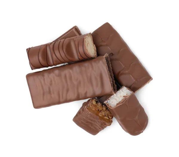 Кусочки Разных Вкусных Шоколадных Батончиков Белом Фоне Вид Сверху — стоковое фото