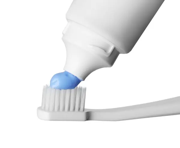 Nakładanie Pasty Szczoteczkę Zębów Białym Tle Zbliżenie — Zdjęcie stockowe