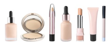 Yüz pudrası ve beyaz üzerine izole edilmiş diğer temellerle ayarlandı