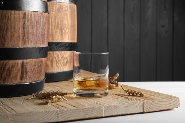 Wooden Barrels Glass Tasty Whiskey Wheat Spikes White Table Space — Stock Photo, Image