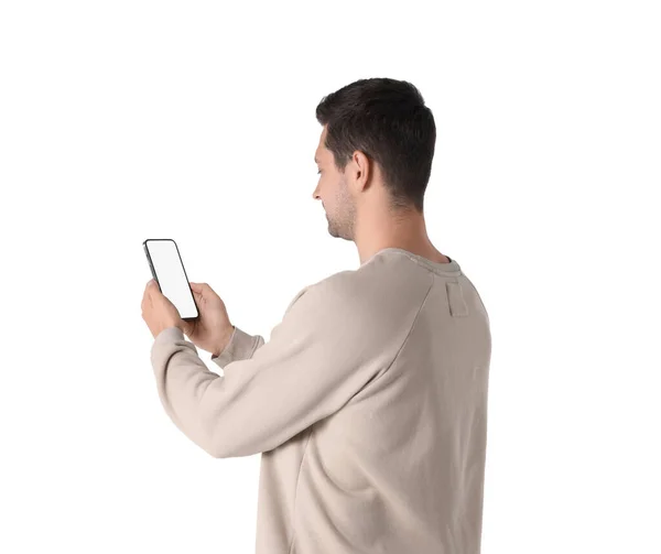 Hombre Sosteniendo Smartphone Con Pantalla Blanco Sobre Fondo Blanco — Foto de Stock