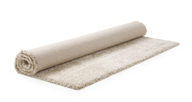 Tüylü halı beyaz arka plan üzerinde yuvarlandı. İç öğesi