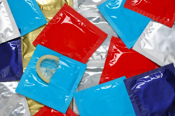 Preservativos Embalados Como Fundo Vista Superior Sexo Seguro — Fotografia de Stock