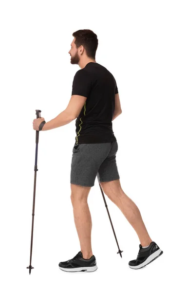 Άνθρωπος Εξάσκηση Σκανδιναβικό Περπάτημα Στύλους Που Απομονώνονται Λευκό — Φωτογραφία Αρχείου