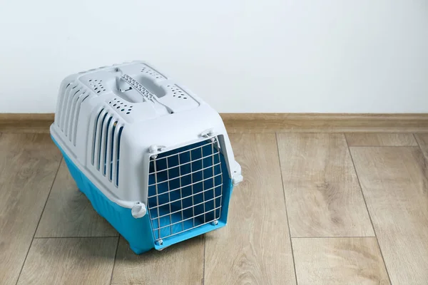 Light Blue Pet Carrier Floor White Wall Space Text — Stock Photo, Image