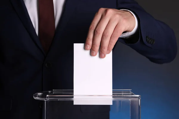 Man Putting His Vote Ballot Box Dark Blue Background Closeup — Stock Photo, Image