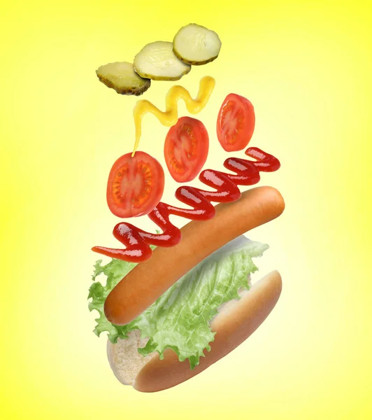 Ingredienti Hot Dog Aria Sfondo Giallo — Foto Stock