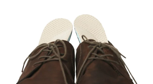 Beyaz Arka Planda Ayakkabılı Ortopedik Tabanlar Yakın Plan — Stok fotoğraf