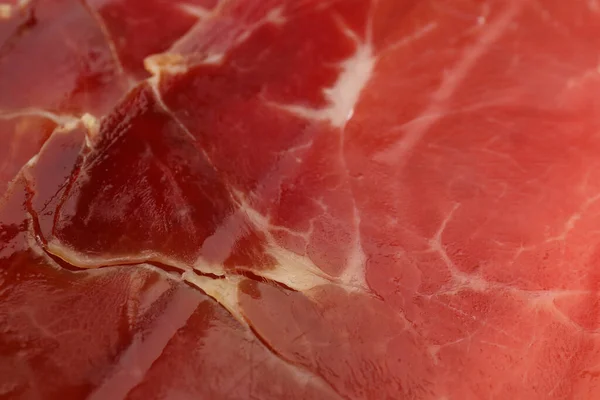 Delicious Sliced Jamon Background Closeup View — Stock Photo, Image