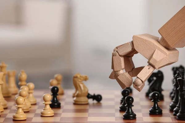 Wooden Hand Representing Artificial Intelligence Robot Moving Chess Piece Board — Stock Photo, Image