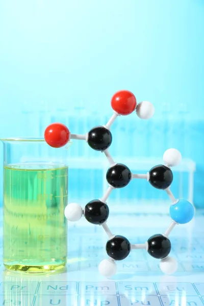 Molecular Model Laboratory Glassware Light Blue Background — Stock Photo, Image