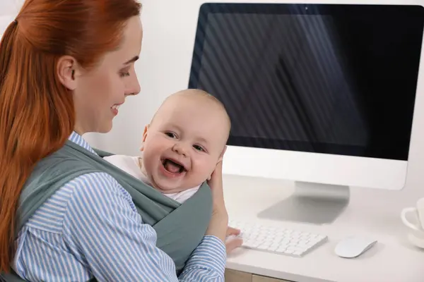 Mother Holding Her Child Sling Baby Carrier Workplace — Stock Photo, Image