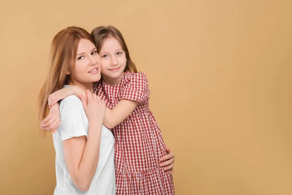 Portrait Mother Her Cute Daughter Beige Background Space Text — Stock Photo, Image