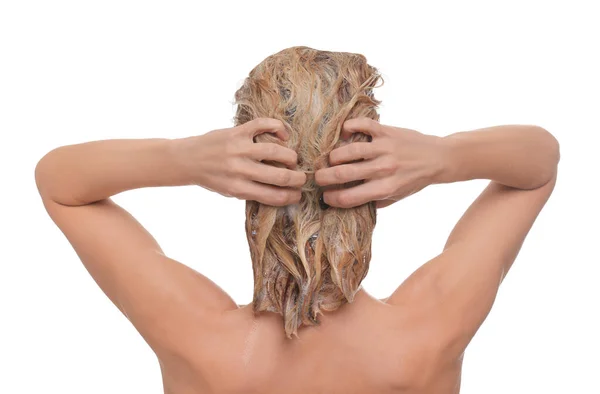 白い背景に髪を洗う女性 バックビュー — ストック写真
