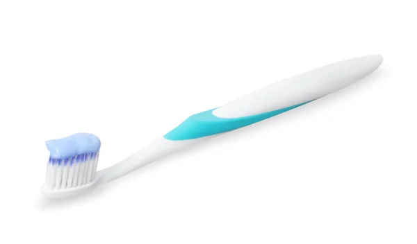 灰色の背景にペーストが付いているプラスチック歯ブラシ — ストック写真