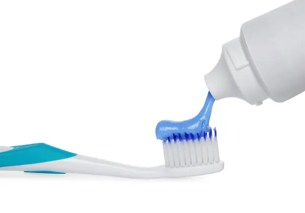 Het Aanbrengen Van Pasta Tandenborstel Tegen Witte Achtergrond — Stockfoto