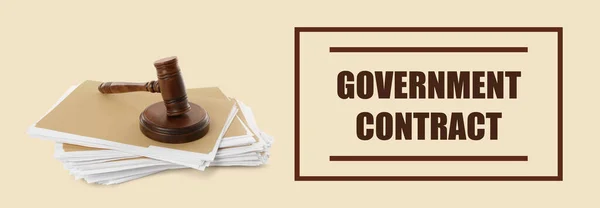 Words Government Contract, wooden gavel and file folders with documents on beige background, banner design