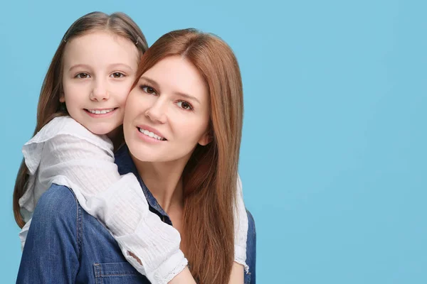 Portrait Happy Mother Her Cute Daughter Light Blue Background Space — Stock Photo, Image