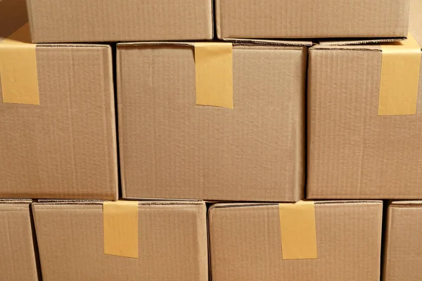 Stack Många Kartonger Som Bakgrund Förpackningsvaror — Stockfoto