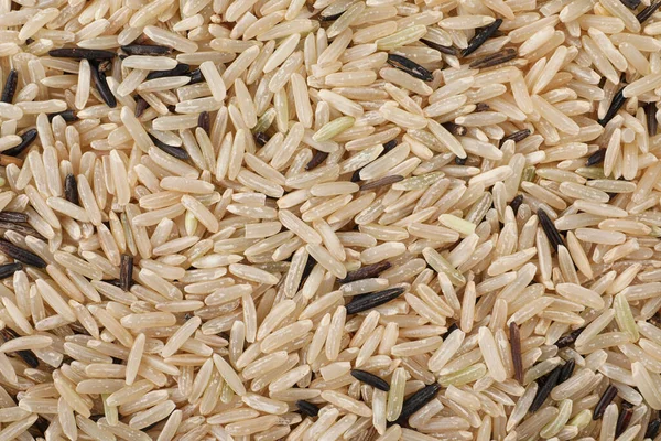 Arka Plan Üstten Görünüm Olarak Cilasız Çiğ Pirinç — Stok fotoğraf