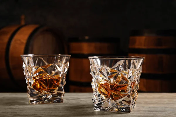 Glasses Whiskey Table Wooden Barrels Closeup — Stock Photo, Image