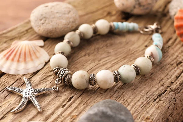 Beautiful Bracelet Gemstones Stones Seashell Wooden Surface Closeup — Stock Photo, Image