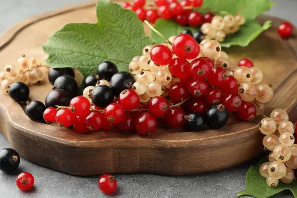 Different Fresh Ripe Currants Green Leaves Table Closeup — Stock Photo, Image