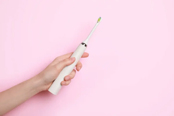Woman Holding Electric Toothbrush Pink Background Closeup — Stock Photo, Image