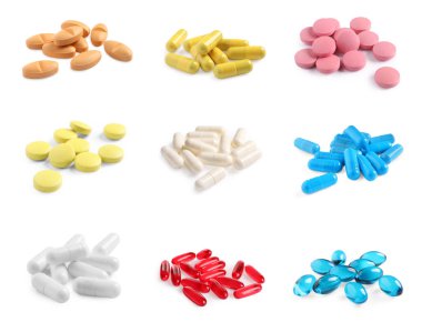 Beyazın üzerine izole edilmiş farklı haplar.