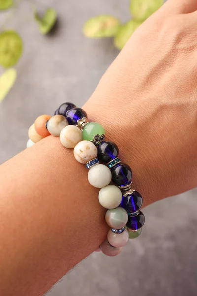 Woman Wearing Beautiful Bracelets Gemstones Blurred Background Closeup — Stock Photo, Image