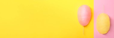 Renkli arka planda pamuk şekerler, üst manzara. Metin için alanı olan pankart tasarımı