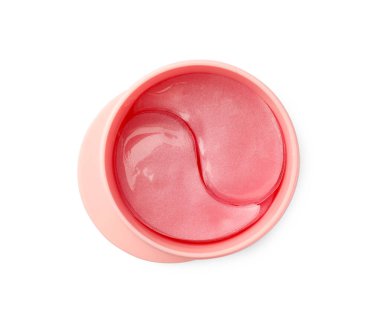 Gözaltı bantlarıyla dolu kavanoz beyaz, üst manzara. Kozmetik ürünü