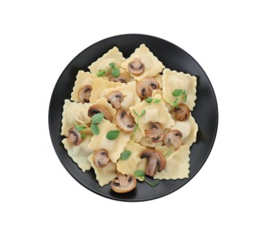 Mantarlı leziz ravioli tabağı beyaz, üstten.