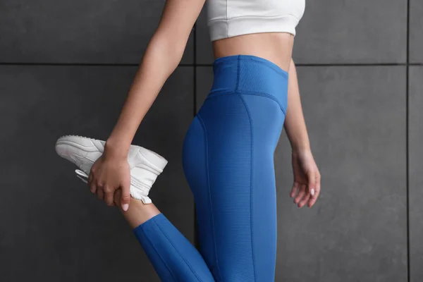 Woman Sportswear Stretching Dark Grey Wall Closeup — Stock Photo, Image