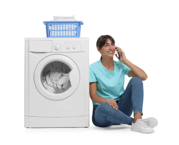 Beautiful Woman Talking Smartphone Washing Machine Laundry White Background — Stock Photo, Image